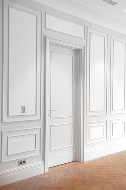 a white door with a handle that says'the door '