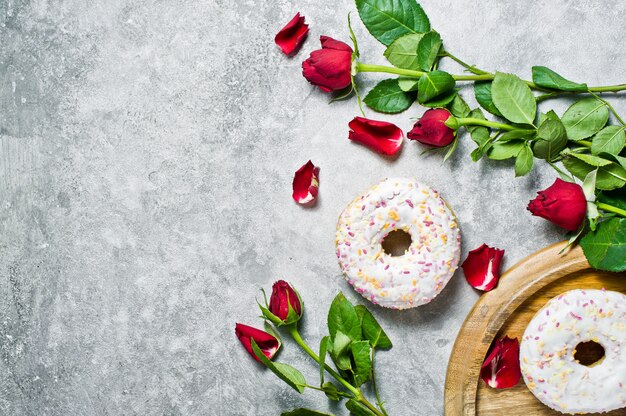 White doughnuts with sprinkles. 