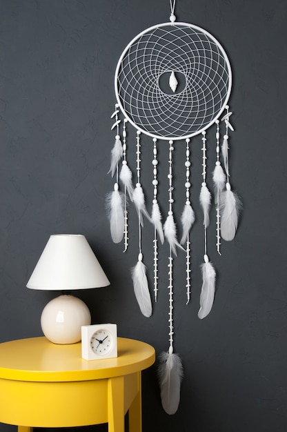 White dream catcher on gray 