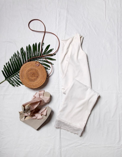 white dress coffee and accessories on a white background the concept of a stylish image