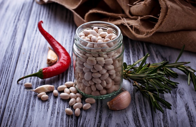 White dry beans in jar.