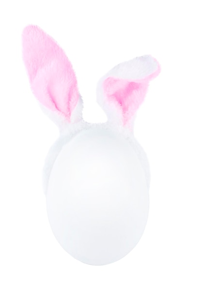 Фото Белое пасхальное яйцо с кроличьими ушами, изолированными на белом