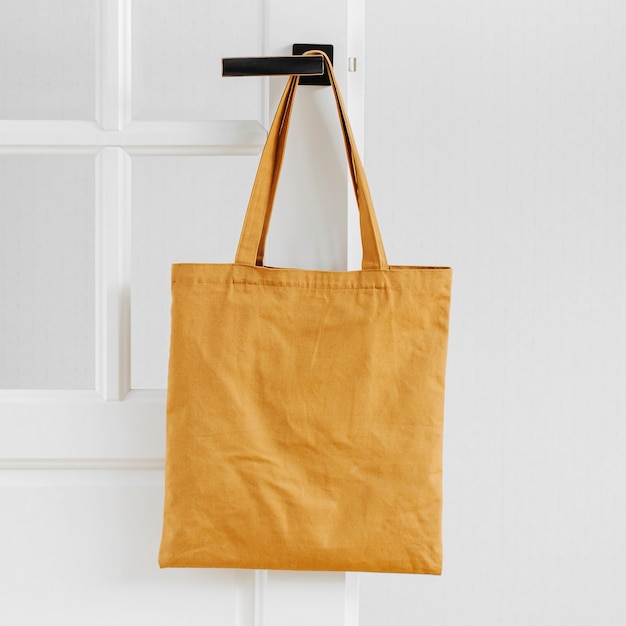 Photo white eco bag mockup. blank shopping sack with copy space. canvas tote bag. eco friendly / zero waste concept.