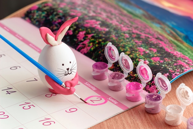 A white egg in the form of a bunny rabbit marks the date of Easter on May calendar