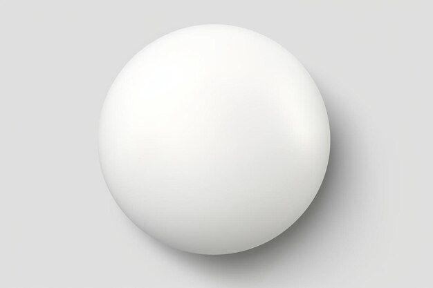 a white egg on a gray surface