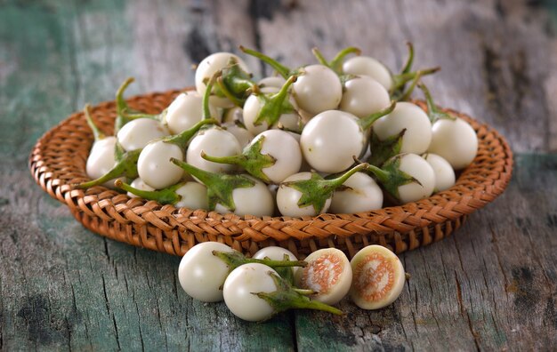 white eggplant on wooden table