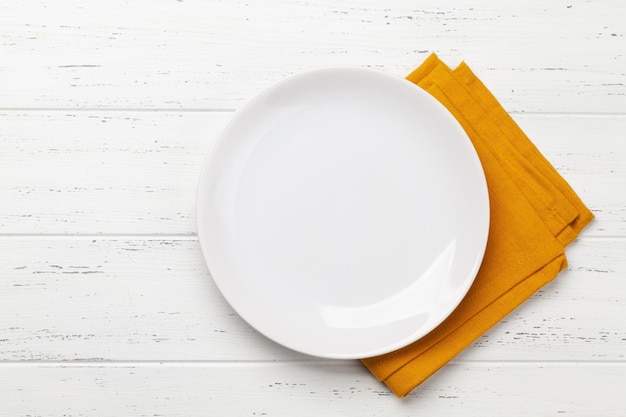 White empty plate and napkin