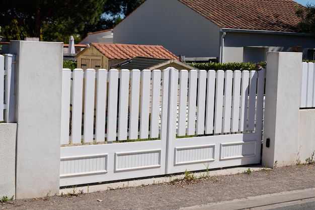 White entry plastic pvc modern style home white gate portal\
polyvinyl chloride modern gate portal of home door of suburbs house\
in street view