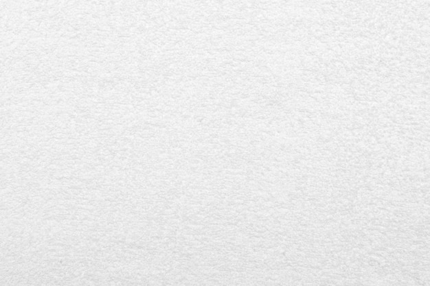 White fabric background.
Terry texture of white fabric.