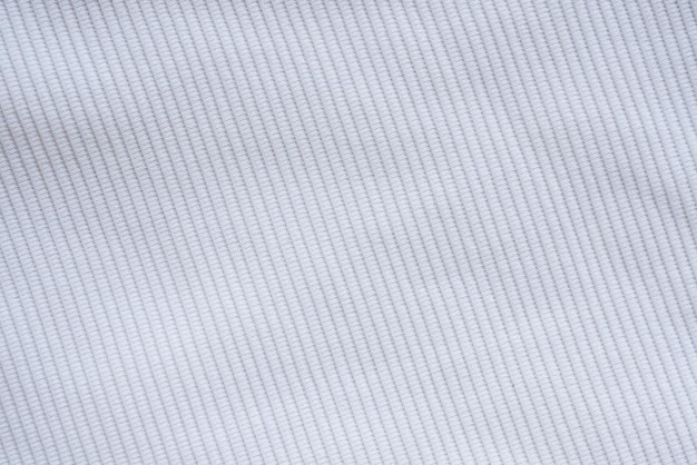 Белая ткань одежды текстуры фона
