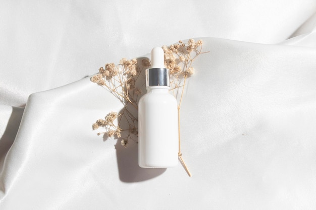 White fabric textile background with lifestyle, cosmetic makeup bottle lotion cream product with beauty fashion skincare healthcare mockup