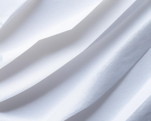 A white fabric with a wavy design is shown.