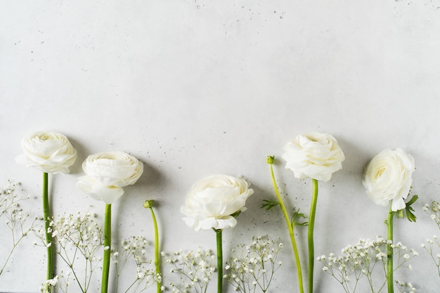 White fashion, flowers flat lay background for mothers day, birthday, easter and wedding