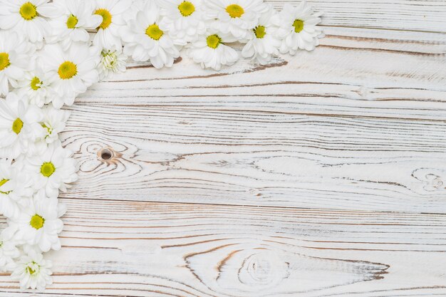 White flowers on wooden table