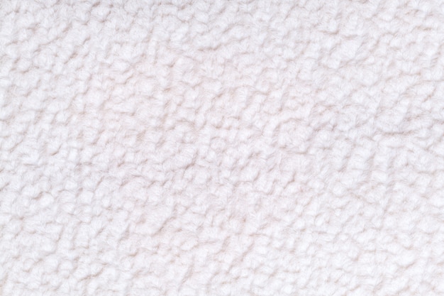 White fluffy background of soft, fleecy cloth