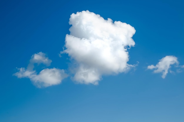 White Fluffy Clouds In Blue Sky Background From Clouds