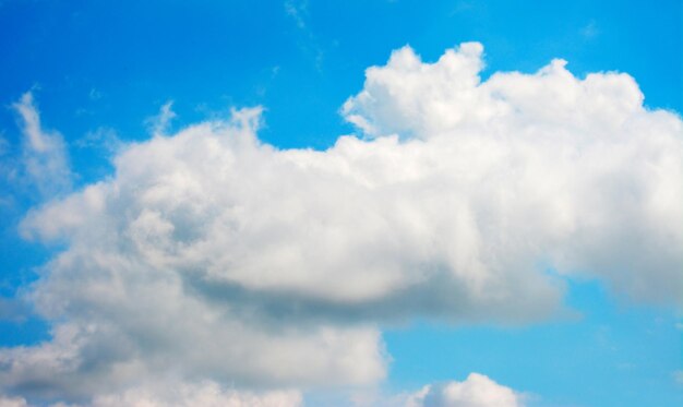 White fluffy clouds in the blue sky