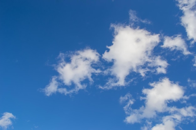 White fluffy clouds in the blue sky