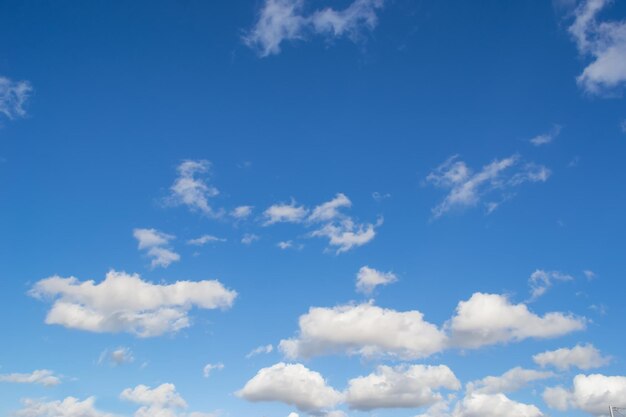 White fluffy clouds in the blue sky