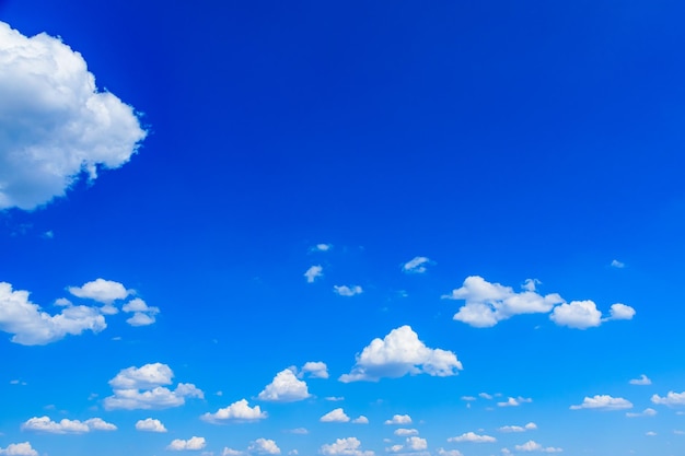 White fluffy clouds in the blue sky