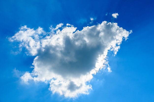 White fluffy clouds in deep blue sky