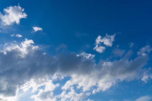 white fluffy clouds isolated on a black background clipart