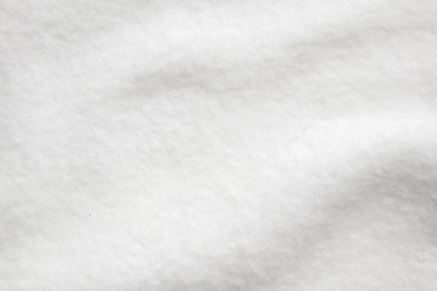 Белый пушистый меховой ткани шерсти текстуры фона