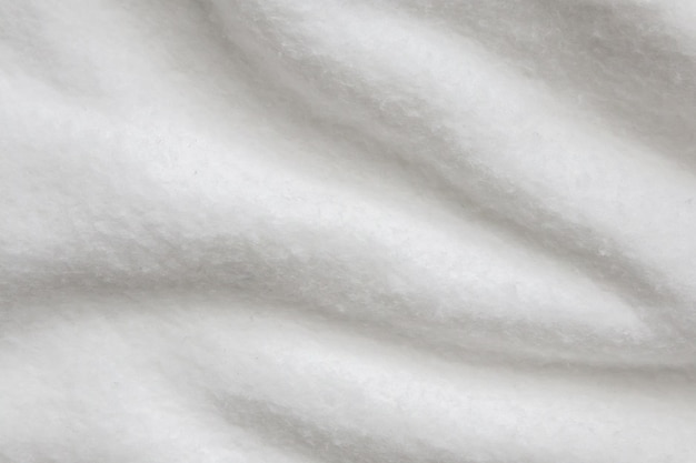 Фото Белый пушистый меховой ткани шерсти текстуры фона