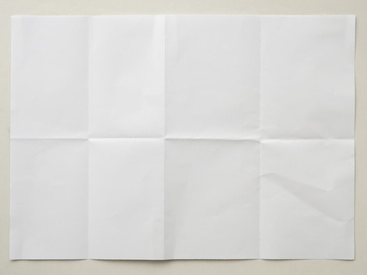 Photo white folded and wrinkled paper on white background