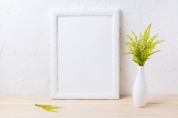 White frame mockup with ornamental grass in exquisite vase