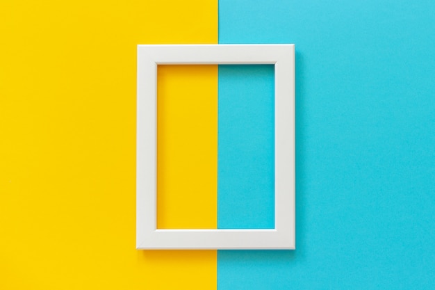 White frame on yellow and blue background