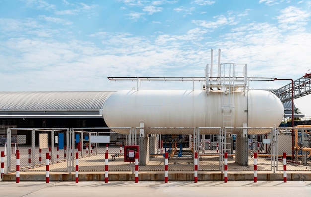 White fuel oil tank for industrial plants with blue sky background