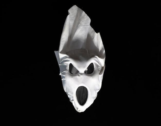 white ghost on a black background