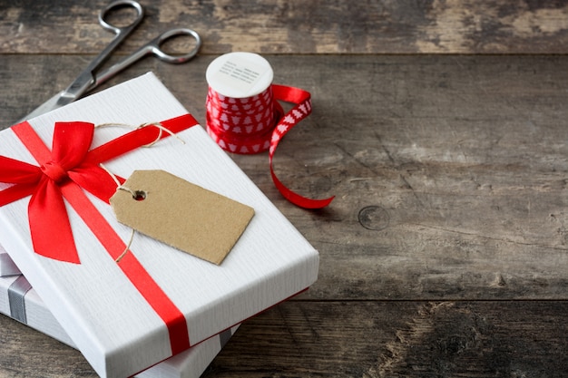 White gift boxes on wooden table