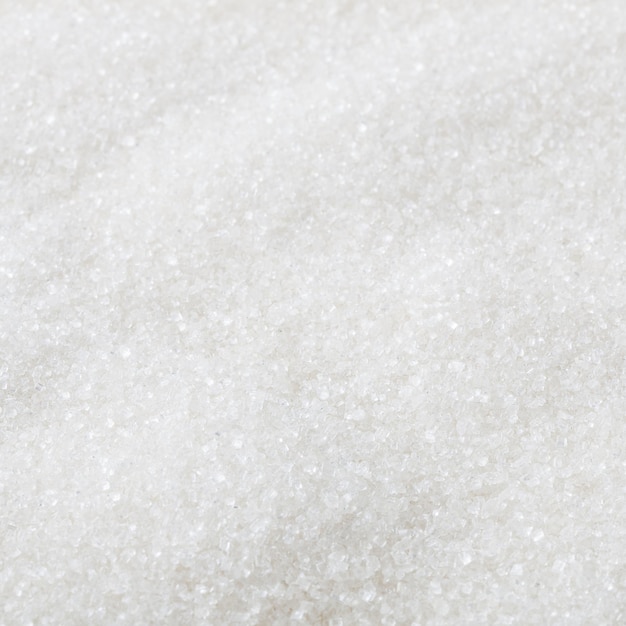 White granulated sugar background