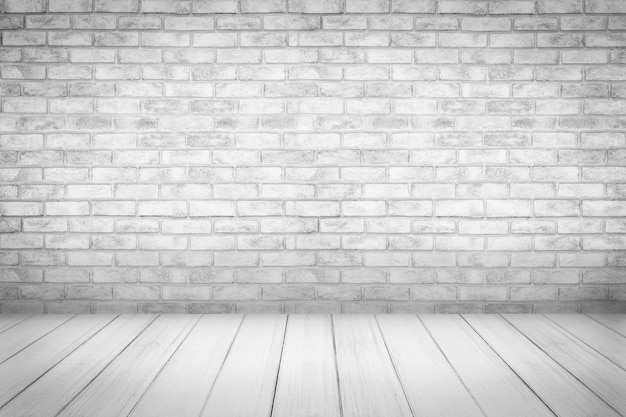 white and gray wood floor with brick wall background