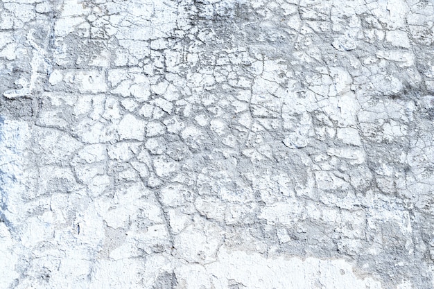 White grunge  cracked cement wall texture abstract background