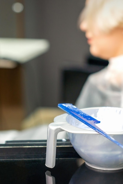 White hair dye in container