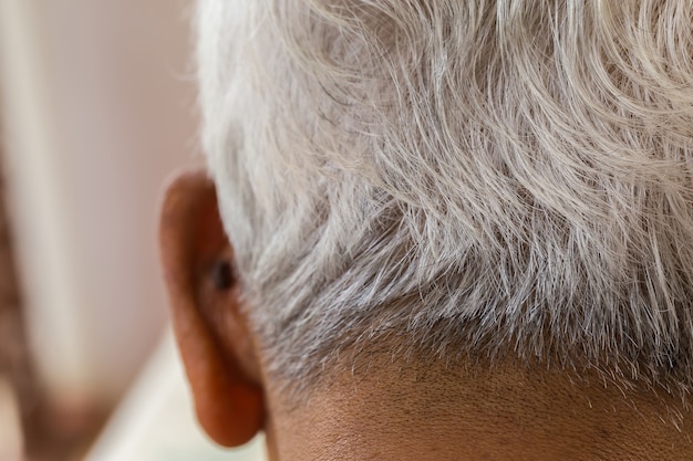 White hair elderly man.