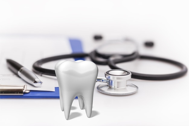 Белый здоровый зуб, различные инструменты для ухода за зубами. Стоматологический фон.