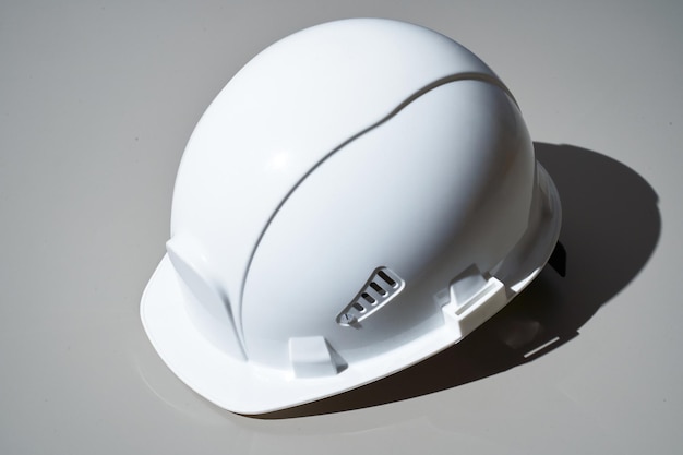 White helmet on grey background View from top