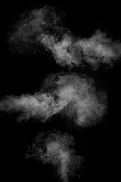 Premium Photo | White horizontal smoke collection on black background. fog  or smoke set isolated on black background. white cloudiness, mist or smog  background.