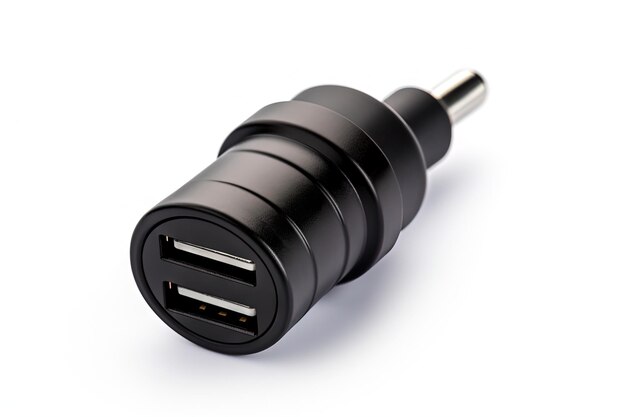 White isolated car charger for black USB electronics device