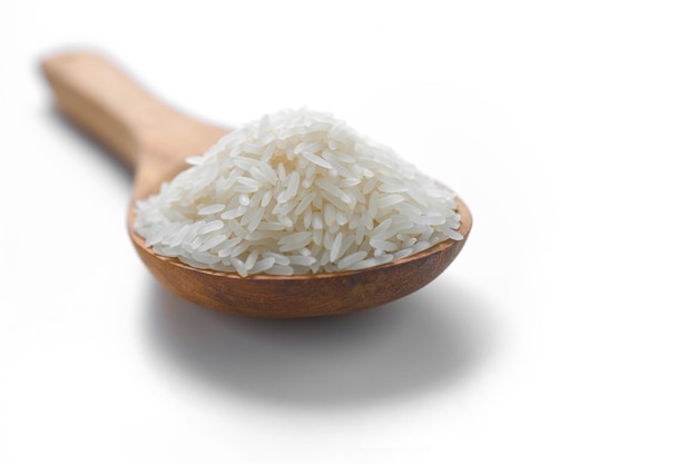 White jasmine rice in the wood spoon