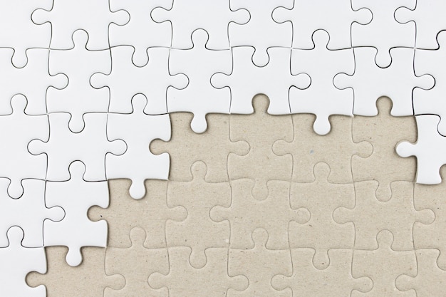 Photo white jigsaw puzzle as background