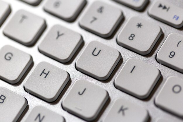 Photo white keyboard keys up close