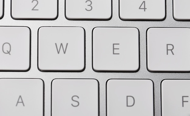 Photo white keys of computer keyboard closeup