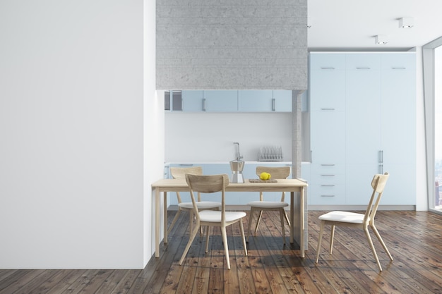 White kitchen interior with a dark wooden floor and blue countertops. A wooden table with wooden chairs. A blank wall fragment. 3d rendering mock up