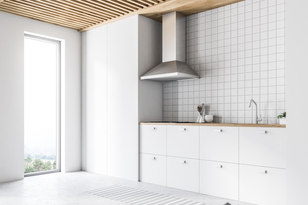 White kitchen interior with white countertops, a narrow window with a nice view and a tiled wall. 3d rendering mock up