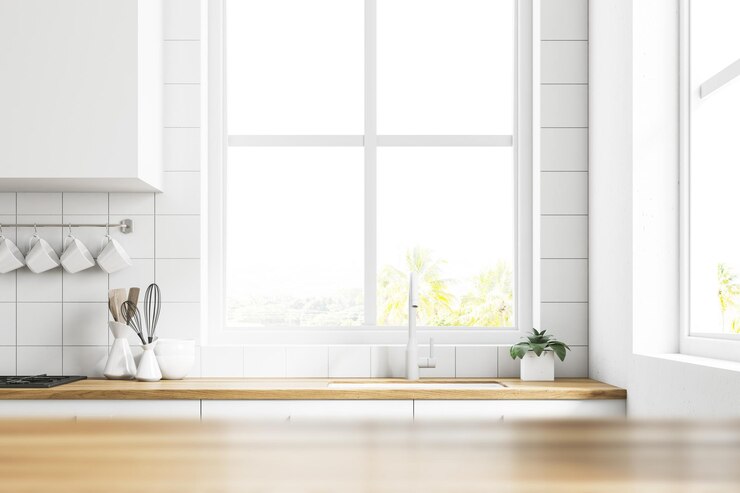 Photo white kitchen interior with white and wooden countertops, a large window and a table in the foreground. 3d rendering mock up